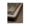 Close-up of solid wood and sintered stone side table on luxury sofa.