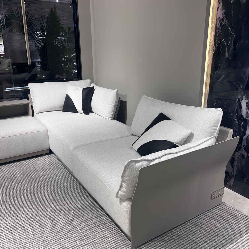 Cozy lounge space in showroom highlighting classic sectional sofa design