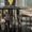 Detailed view of gold-finished spiral metal base on luxury marble dining table in stylish restaurant décor