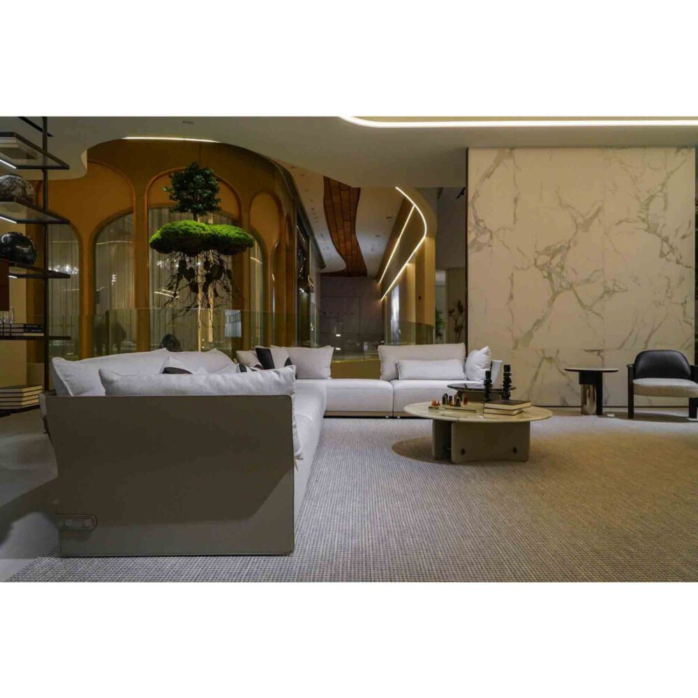 Luxury living room showroom featuring Old Money style sectional sofa
