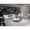 Luxury living room showroom featuring Old Money style sectional sofa and elegant built-in bookshelf baseboard