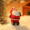Standing Santa Claus figurine holding a golden bell, resin decoration for holiday shelf or tabletop.