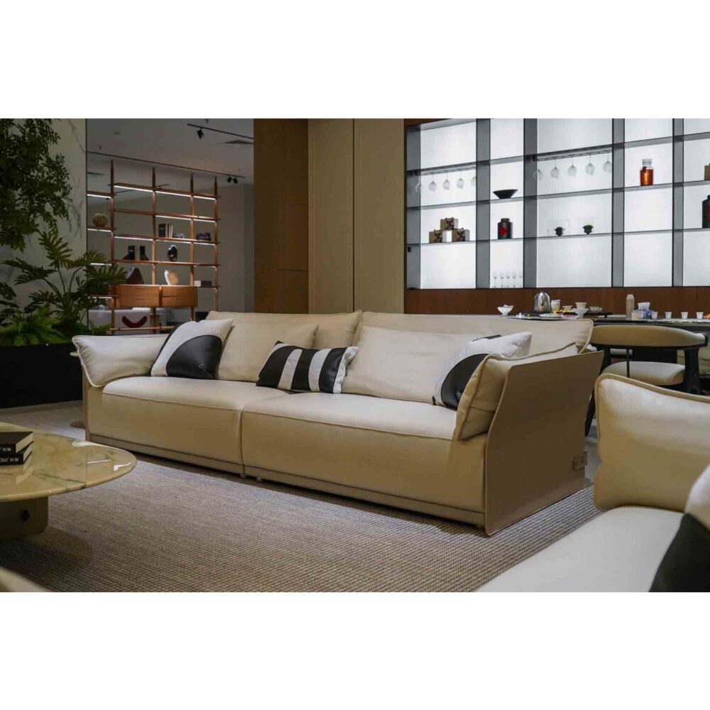 Upscale showroom interior with metal frame sectional sofa and minimalist decor