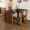 Détail de la jambe de table à manger classique en silhouette arquée et finition des cendres blanches avec un encadré en pierre en travertin solide