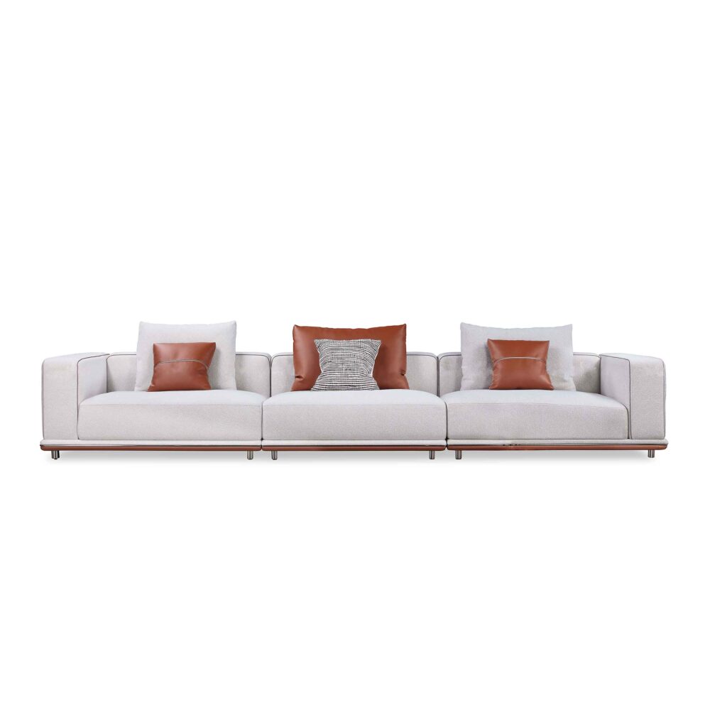 contemporary luxury, modular sofa, stainless steel base, leather accent pillows, upscale living room interiors