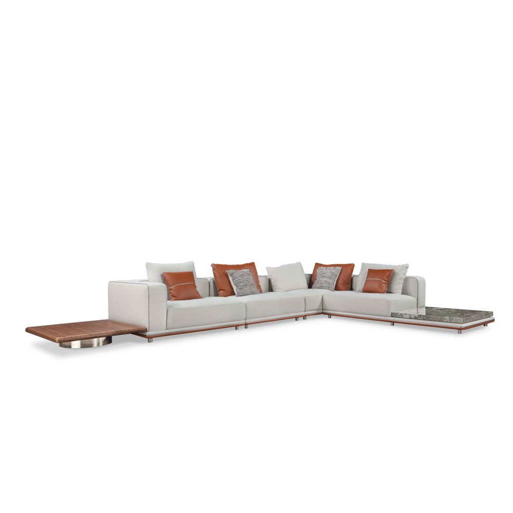 Functional display surface in solid wood and stone beside sofa seat.