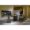 Elegant furniture showroom display with Italian leather dining chairs and wood table