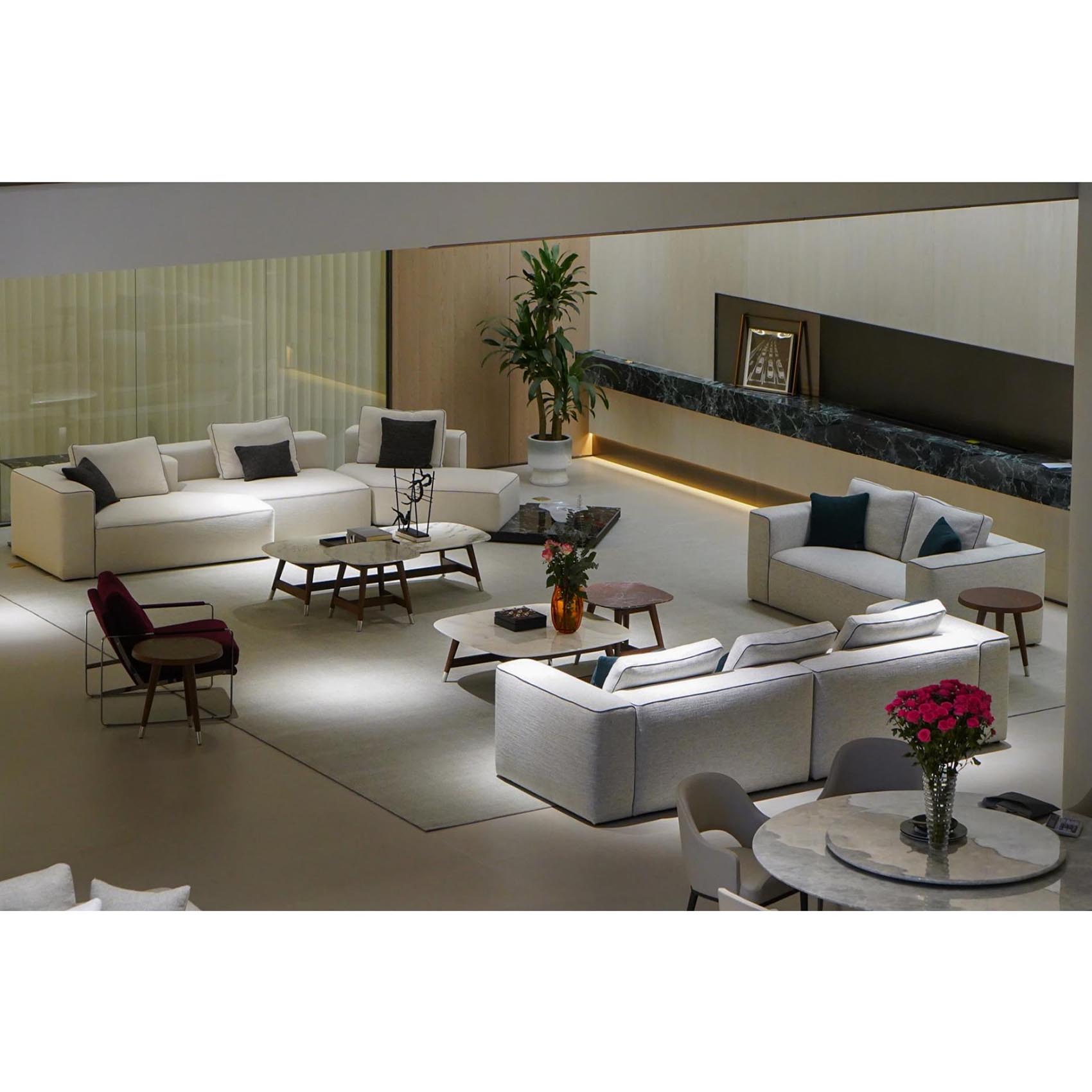 Wide-angle view of Maystopia’s new showroom, showcasing multiple furniture sets and Italian-style décor.